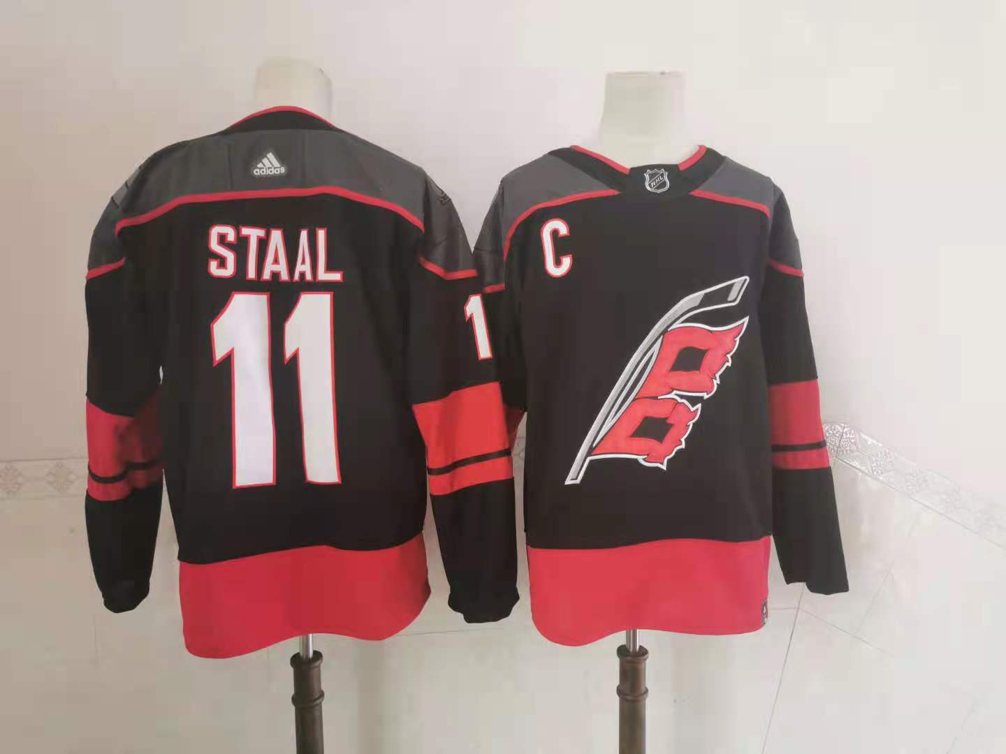 Personalized Hurricanes 11 Jordan Staal Black 2020-21 Reverse Retro Jersey
