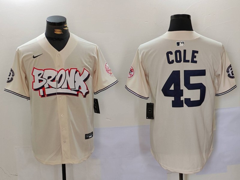Personalized Men’s New York Yankees #45 Gerrit ColeCream The Bronx Graffiti V2 Limited Stitched Baseball Jerseys