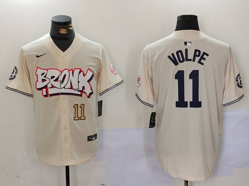 Personalized Men’s New York Yankees #11 Anthony Volpe Cream The Bronx Graffiti V2 Limited Stitched Baseball Jersey